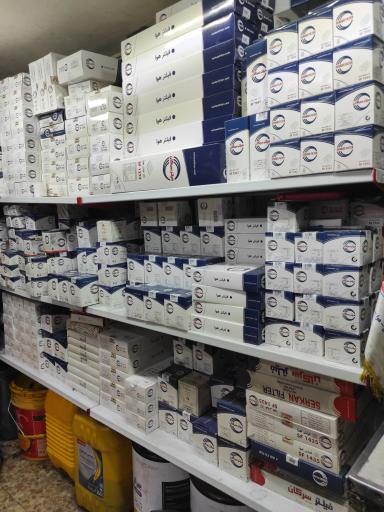 عکس تعویض روغن و پنچرگیری رسول