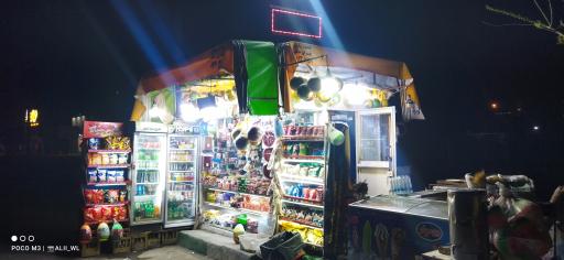 عکس دکه روزنامه فروشی و تنقلات رضازاده