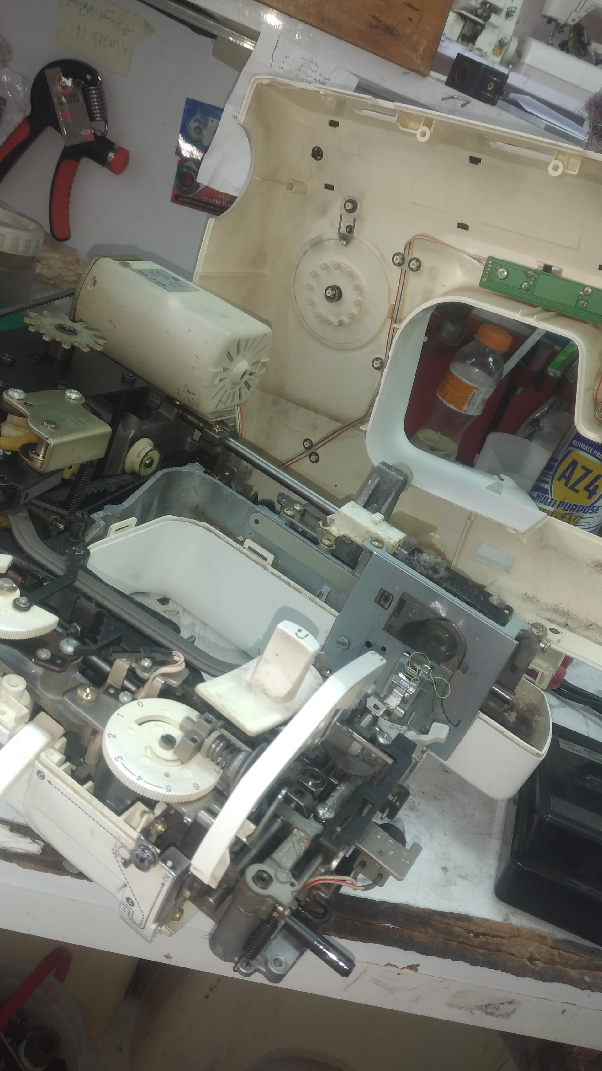 عکس تعمیرات چرخ خیاطی