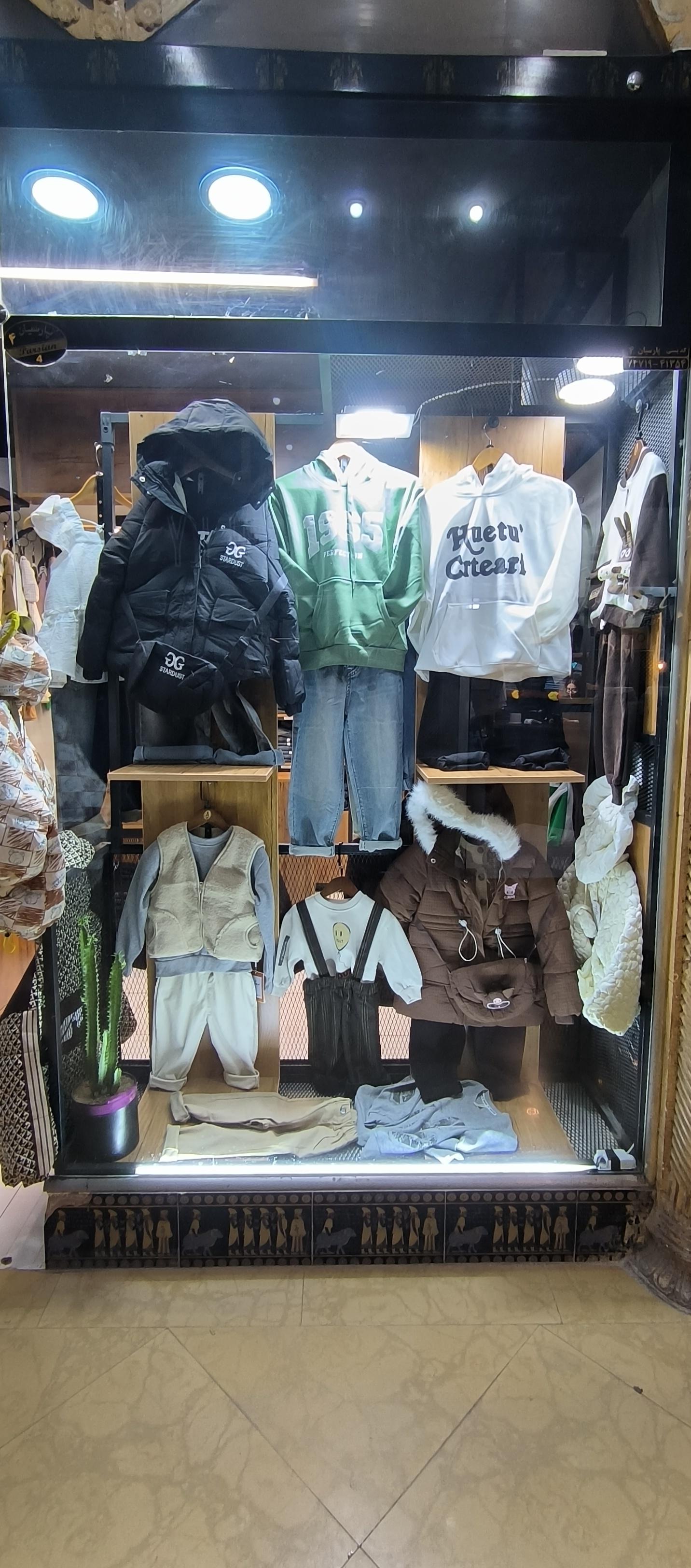 عکس فروشگاه لباس تی گالری