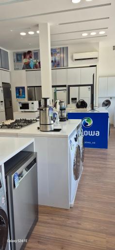 عکس فروشگاه زنجیره ای لوازم خانگی اسنوا