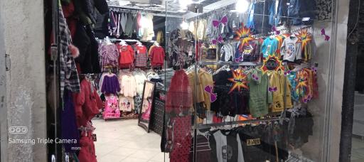 عکس پوشاک بچه گانه پاپیون 