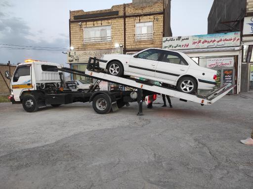 عکس مرکز خدمات فنی خودرو آسمان آبی