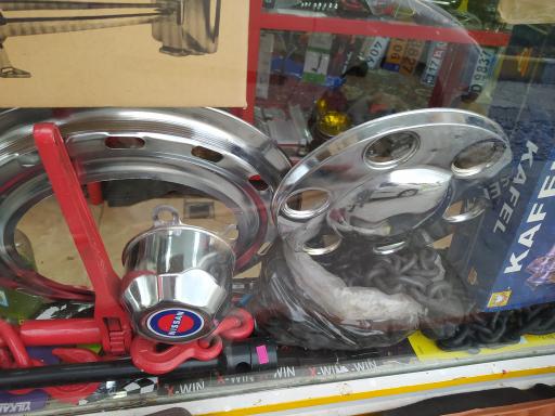 عکس فروشگاه تزئینات و یدکی مصطفی