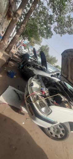 عکس تعمیرگاه کولر خودرو دنیای سرما