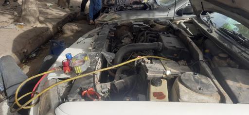 عکس تعمیرگاه کولر خودرو دنیای سرما