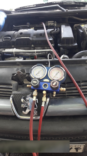 عکس تعمیرگاه کولر خودرو دنیای سرما