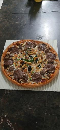 عکس پیزا تنوری سنگی آتور 