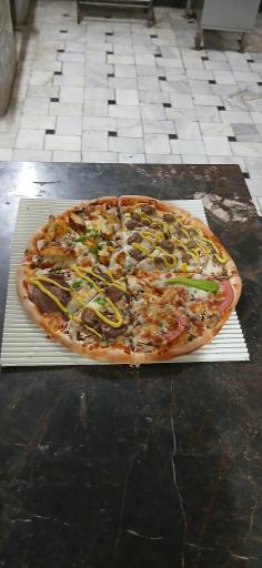 عکس پیزا تنوری سنگی آتور 