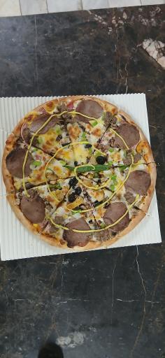 عکس پیزا تنوری سنگی آتور 