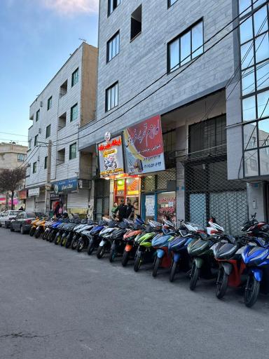 عکس فروشگاه موتورسیکلت 2002