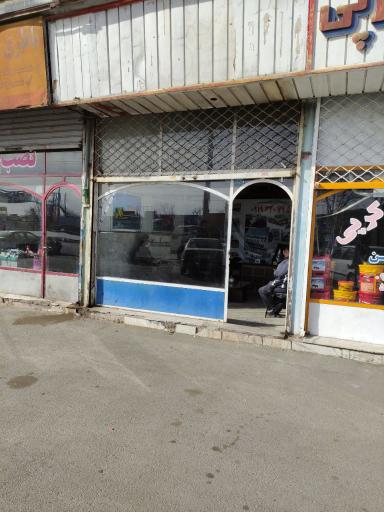 عکس نمایندگی خرید و فروش خودرو بر میلاد