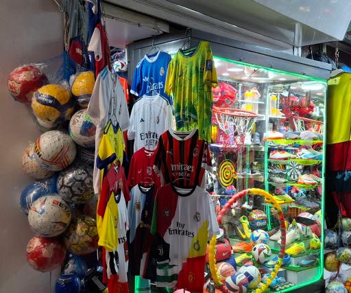 عکس فروشگاه لوازم ورزشی المپیا