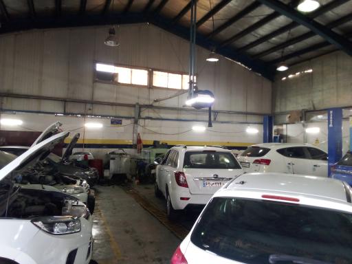 عکس تعمیرات خودرو چینی مجاهد