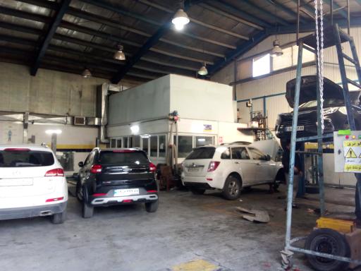 عکس تعمیرات خودرو چینی مجاهد