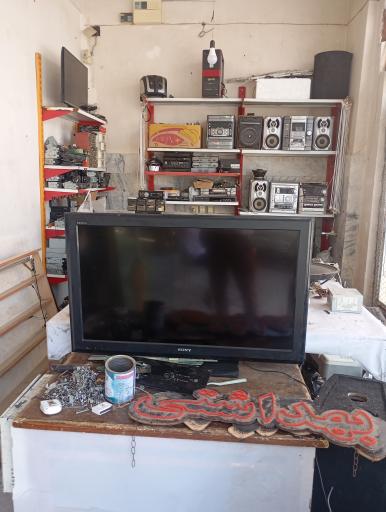 عکس تعمیر تلویزیون و ال ای دی