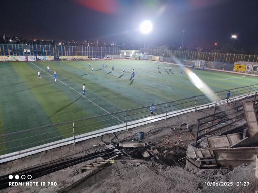 عکس زمین فوتبال باران