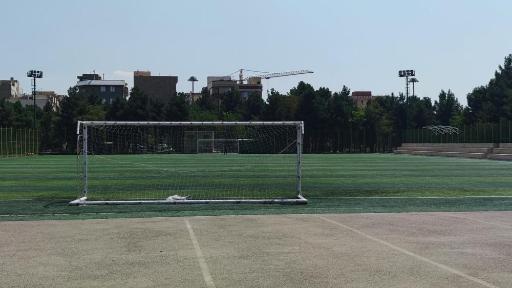 عکس زمین فوتبال باران