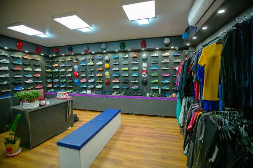 عکس لباس و کفش ورزشی اسپرت لند