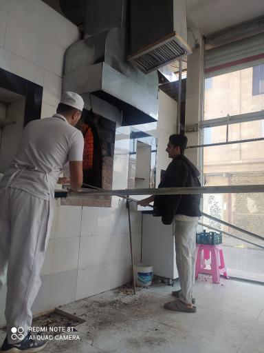 عکس نانوای سنگک