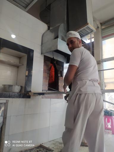 عکس نانوای سنگک