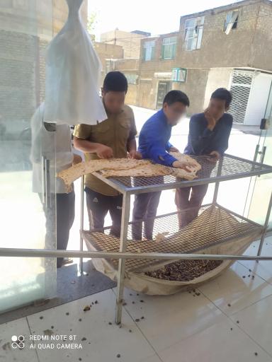 عکس نانوای سنگک