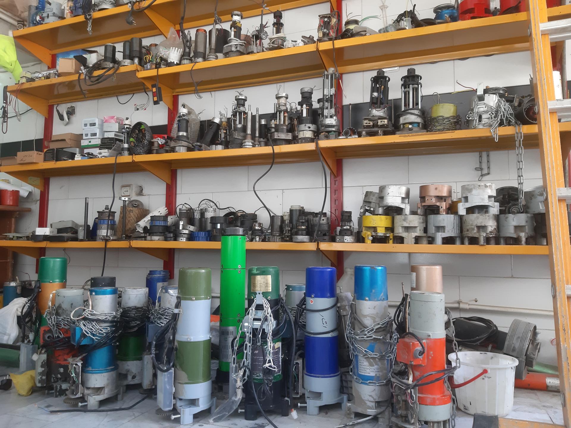 عکس تعمیرات کرکره برقی و جک پارکینگ مهرداد