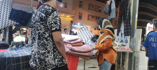 عکس مرکز خرید پوشاک گناوه