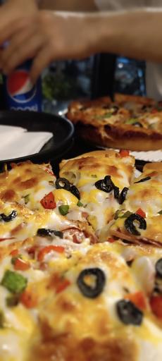 عکس پیتزا میخوش