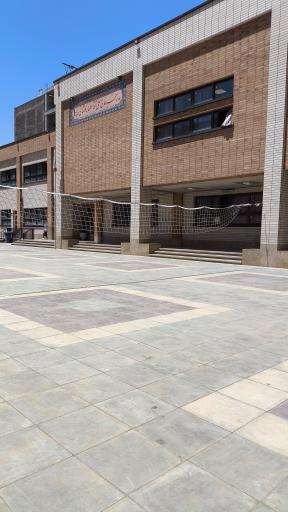 عکس مدرسه حاج علی عصار کاشانی و پسر