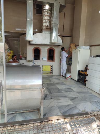 عکس نانوایی سنگکی و لواشی