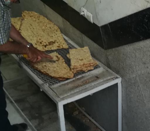 عکس نانوایی سنگکی سنتی ساعی