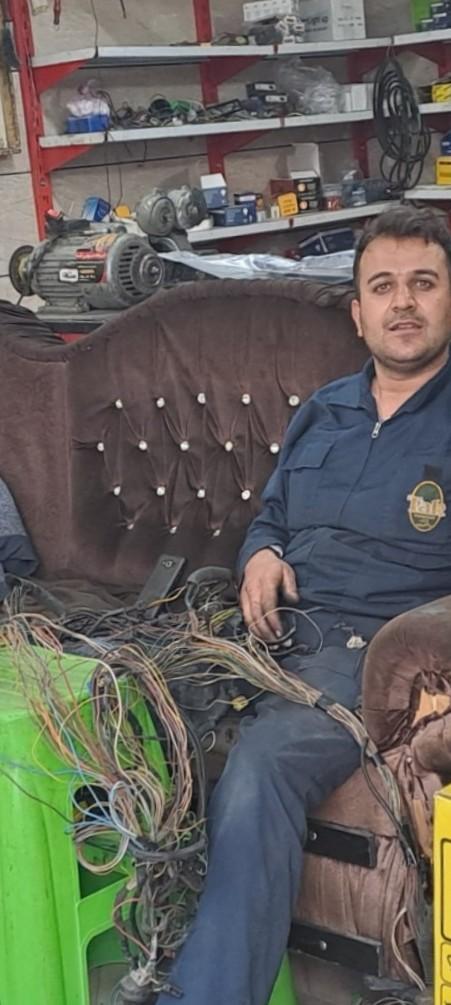 عکس برق خودرو و باطری فروشی ناسیونال