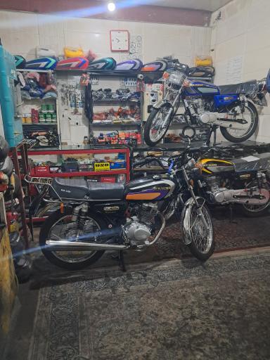 عکس تعمیرگاه موتورسیکلت 2011