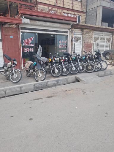 عکس تعمیرگاه موتورسیکلت 2011
