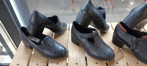 عکس فروشگاه کیف و کفش تیک سات