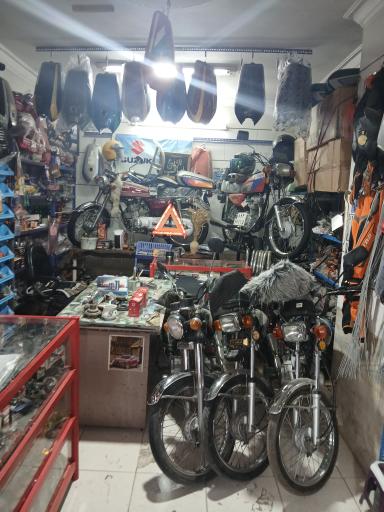 عکس مغازه موتور سیکلت رضا 