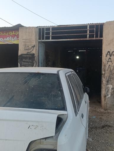 عکس تعمیرگاه مکانیکی استاد ابراهیم با پسران