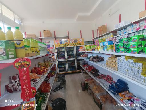 عکس سوپر مارکت توکل