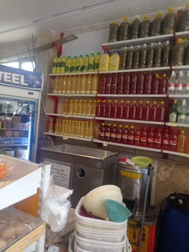 عکس آبمیوه گیری ترشی فروشی و تصفیه گوجه فرنگی طبیعت