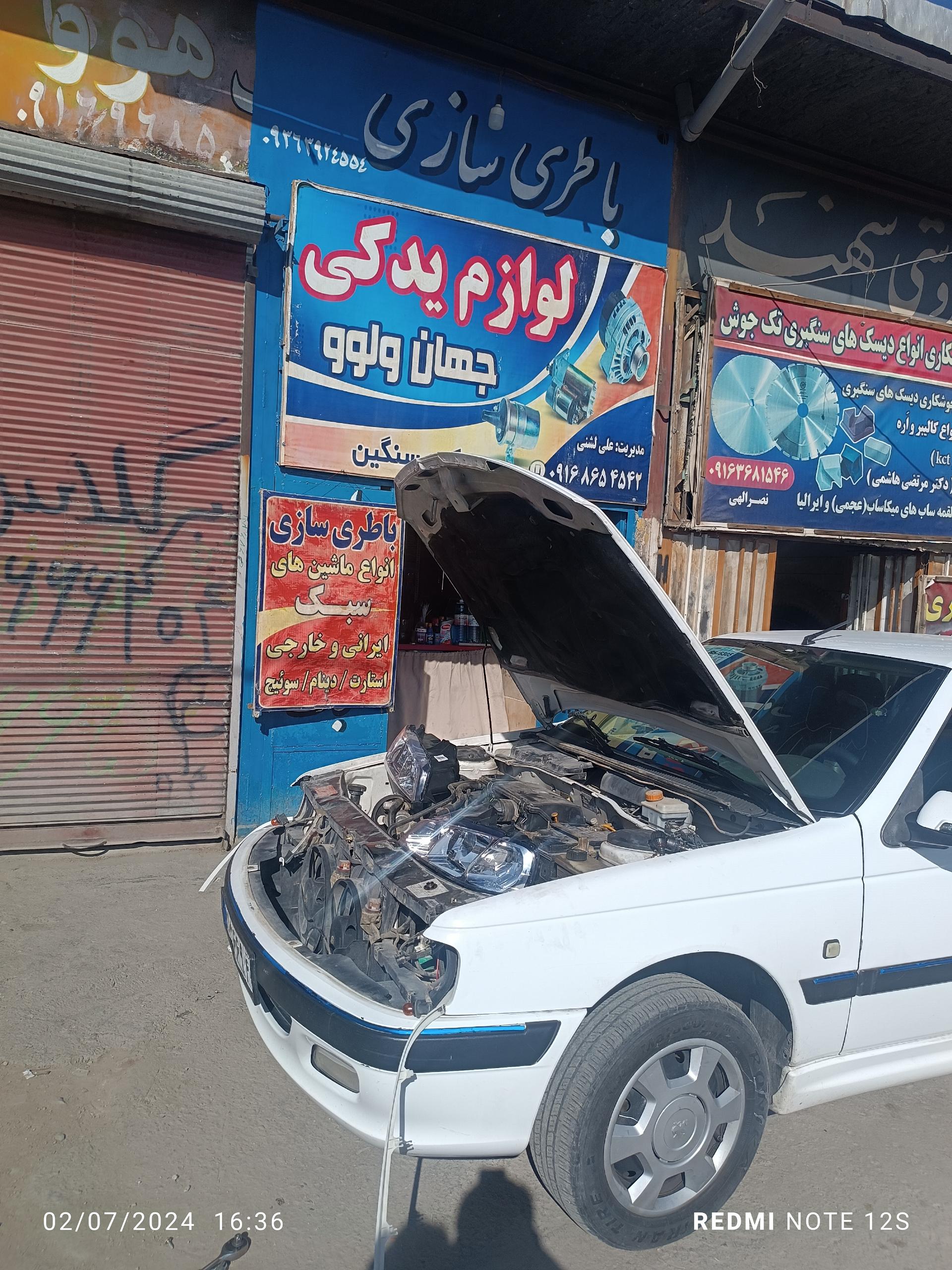 عکس برق کاری و باطری سازی جهان ولوو