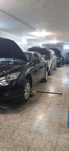 کلینیک برق و الکترونیک خودرو پاسارگاد