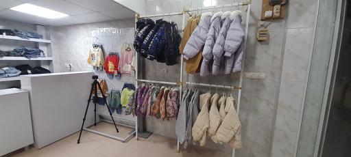 عکس فروشگاه لباس کودک و نوجوان دلبند