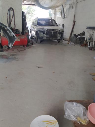 عکس تعمیرگاه و خدمات خودرو تک سواران