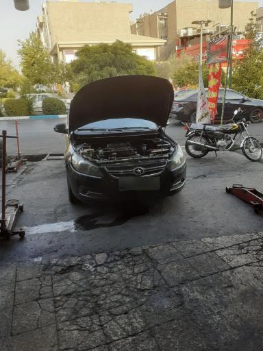 عکس بوستر سازی و تعمیرات ترمز اطمینان