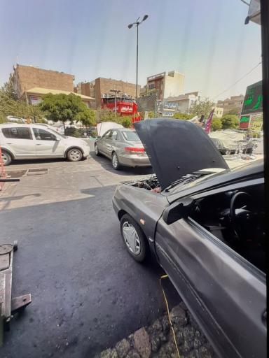 عکس بوستر سازی و تعمیرات ترمز اطمینان