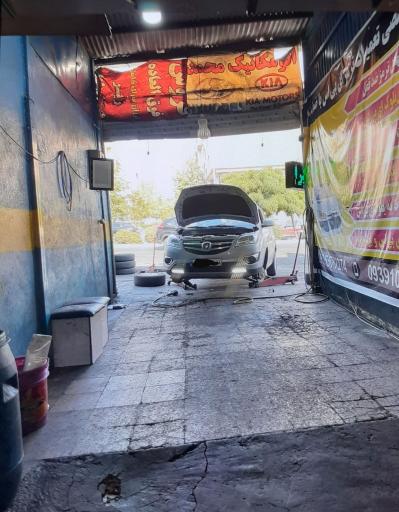 عکس بوستر سازی و تعمیرات ترمز اطمینان