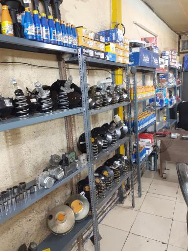 عکس بوستر سازی و تعمیرات ترمز اطمینان