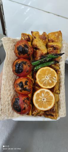 عکس تهیه غذای شمس العماره