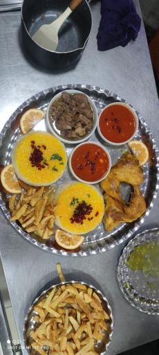 عکس تهیه غذای شمس العماره